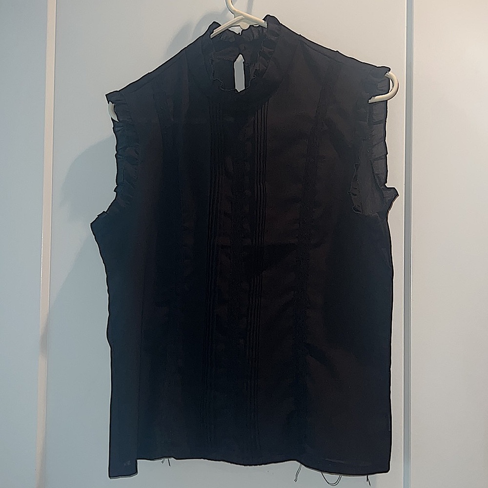 Black sleeveless blouse